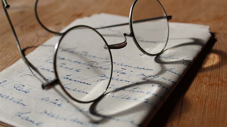 Reading Glasses on Handwritten Letter