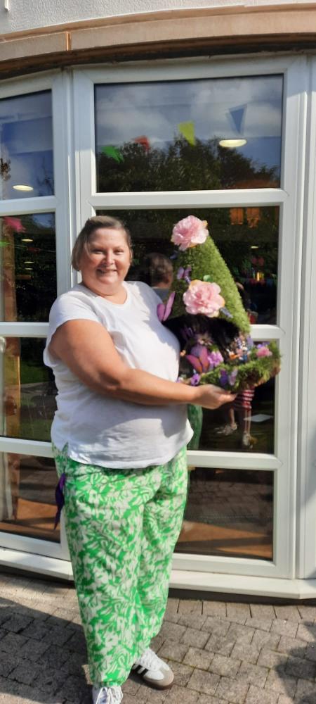 Templeton House Care Home's Summer Fete raises funds for an interactive table, enhancing the lives of residents with meaningful engagement and activities