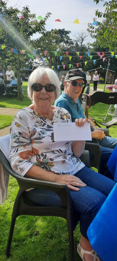 Templeton House Care Home's Summer Fete raises funds for an interactive table, enhancing the lives of residents with meaningful engagement and activities