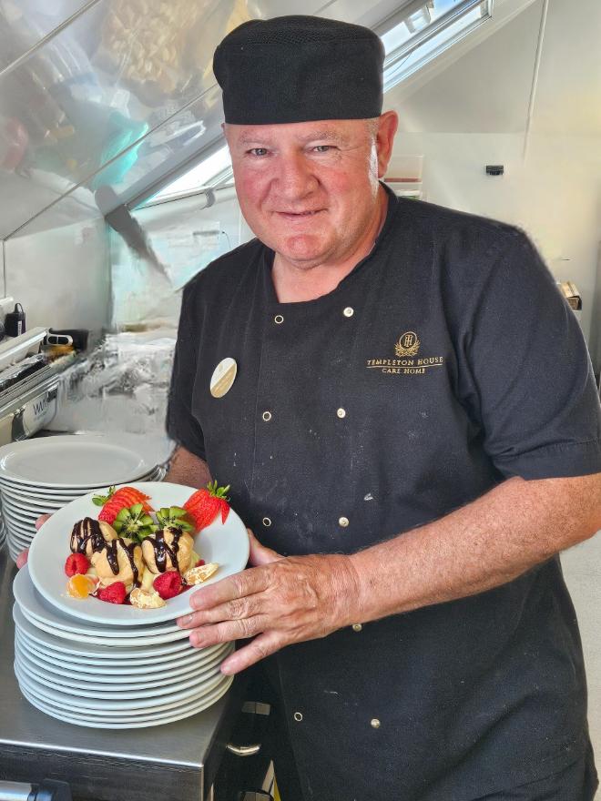 Chef with meal
